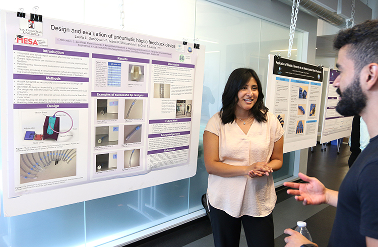 REV participant, Laura Sandoval, with her research project poster in the CSNE